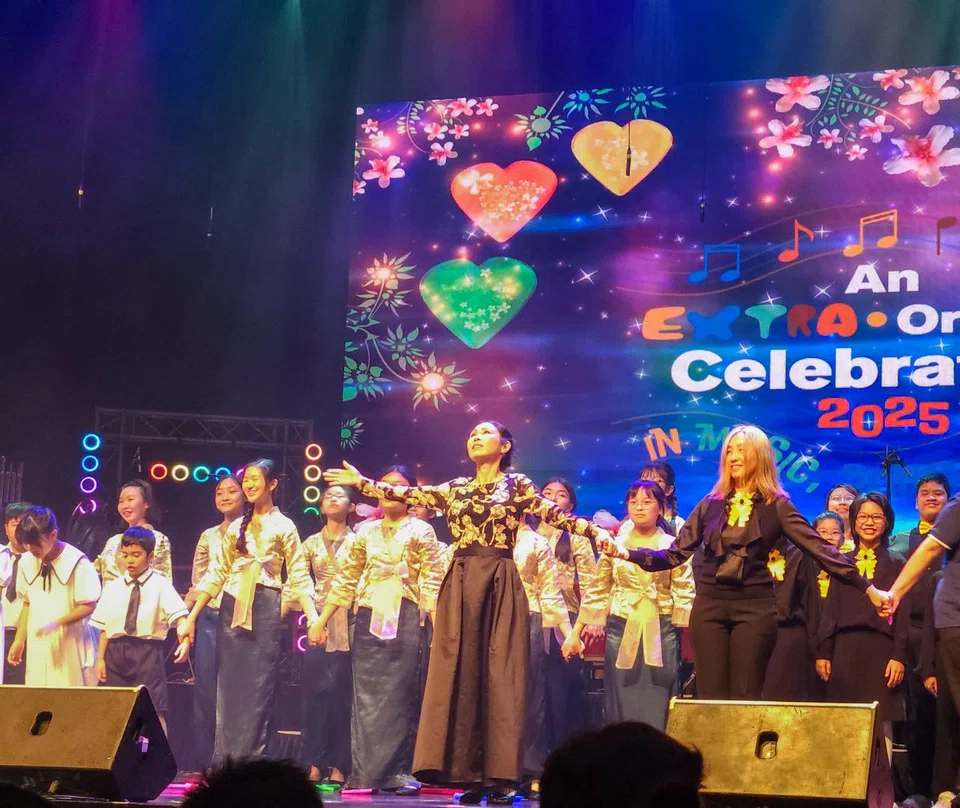 Anna Loo conducts with heart as students of all abilities perform side by side. TNP PHOTO: TEO YAN TING