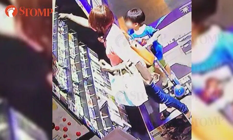 Woman takes PS4 games at Hougang Mall -- but only pays up after video of her gets posted on FB
