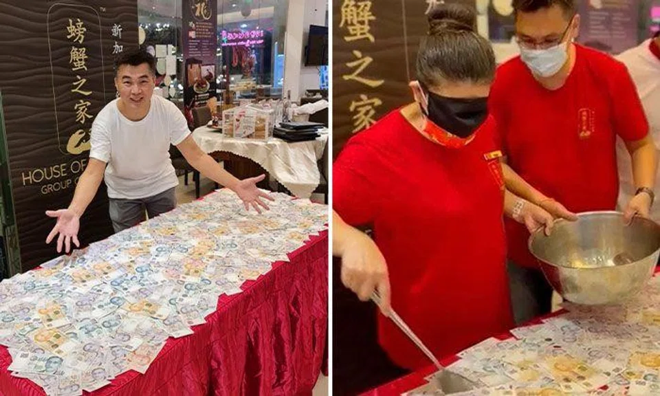 House of Seafood prepares table with $33,888 cash for staff to scoop up for CNY