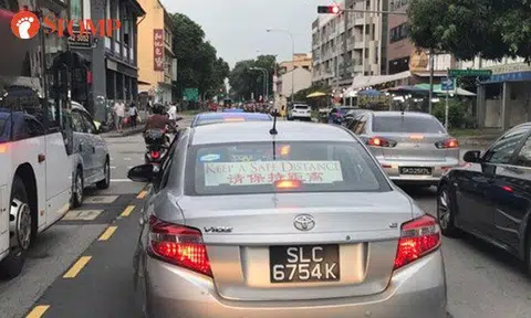 With a huge sign blocking your view, motorists should keep a safe distance indeed