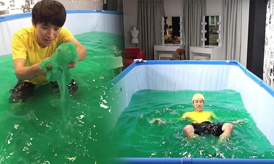 Guy attempts to swim in pool filled with slime