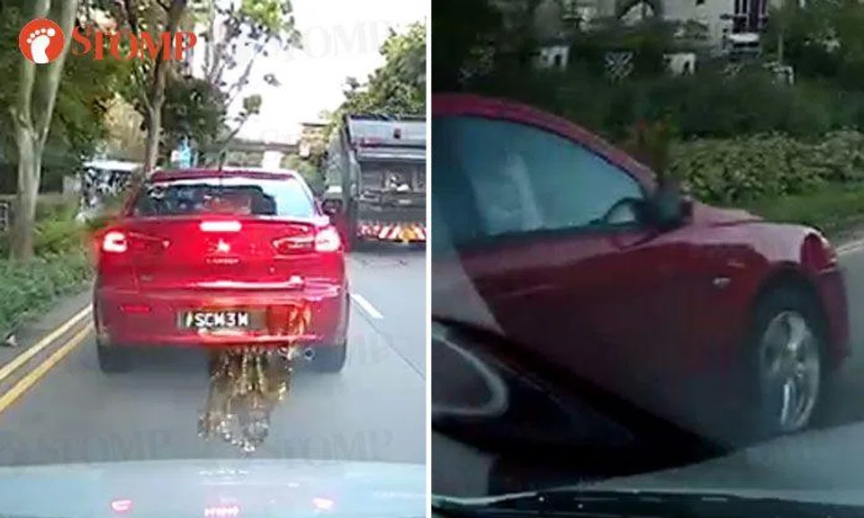 Female driver makes hand gesture and plays braking game after changing lane without signalling