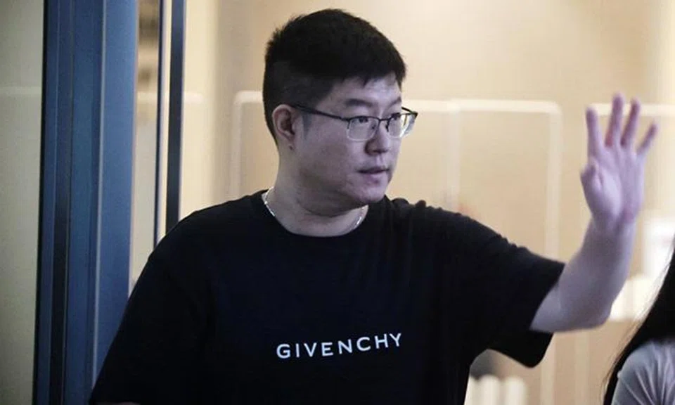 Wang Yue pleaded guilty to 34 copyright violations for himself and his firm, Ace Technologies. ST PHOTO: KELVIN CHNG