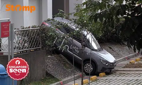GetGo car ends up mounted on sloped kerb near Bishan HDB block, police investigating