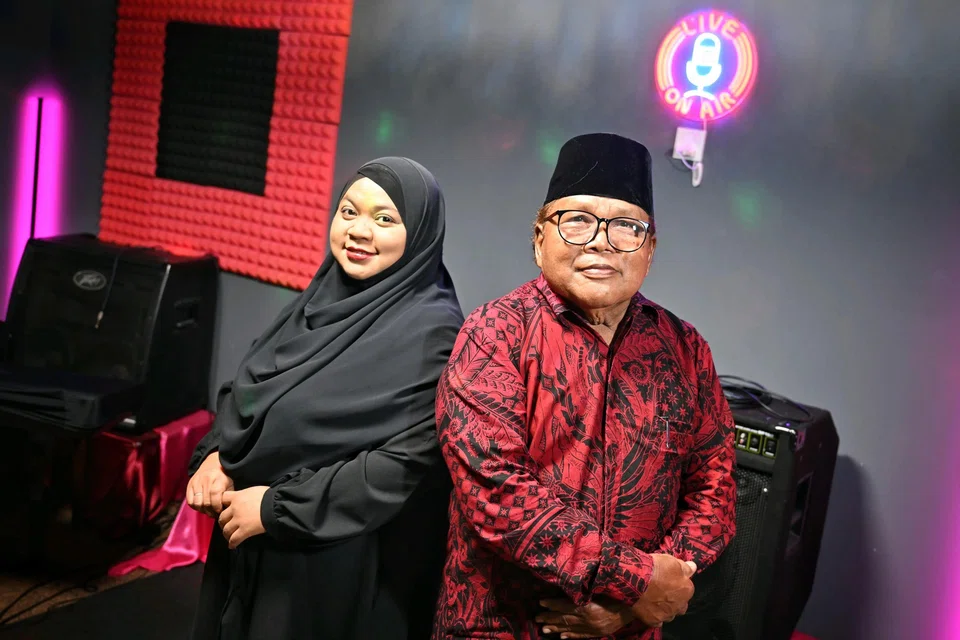  Mr Mohd Nazir Dolah with his daughter Irma Yanti. Much of his childhood was spent diving in the azure waters off Pulau Samulun and Pulau Merimau.