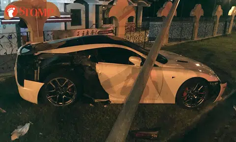 Lexus driver loses control, crashes car into lamp post near Siglap Church