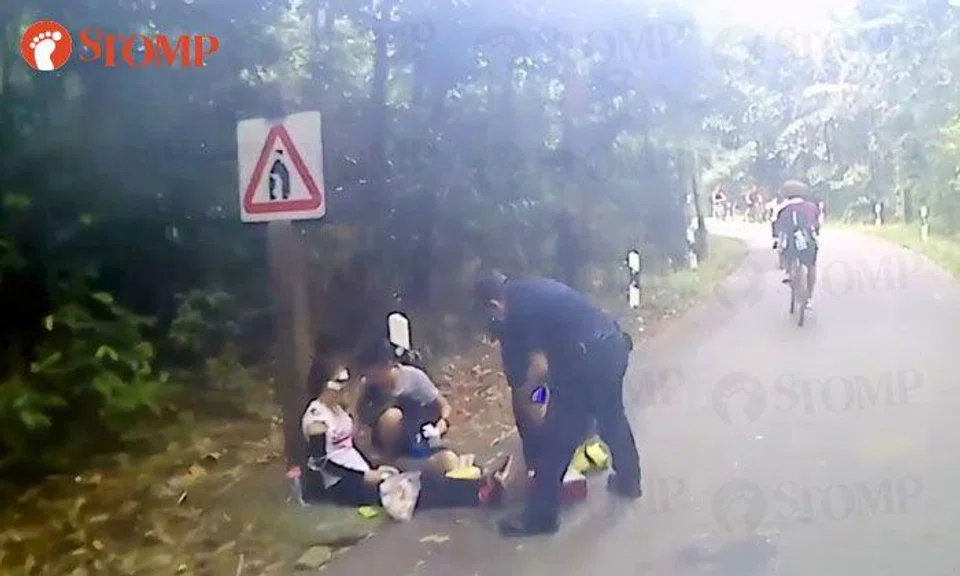 Kudos to police officers who stopped to help woman who fell off bike at Pulau Ubin