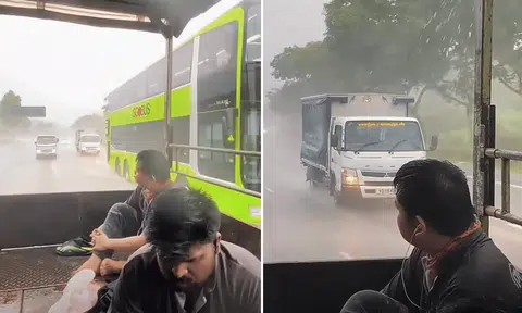 A video of two workers at the back of a moving lorry taken from inside the vehicle on a rainy day has sparked a lively discussion about hardship. 