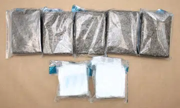 A total of 5,127g of cannabis and 2,072g of methamphetamine were seized