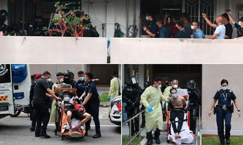 The two men had locked themselves in a flat together with their 77-year-old mother. PHOTOS: SHIN MIN DAILY NEWS