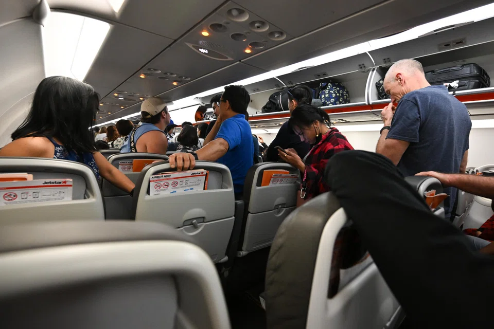 A third of respondents from Singapore, Australia and India say they would wake a passenger in an aisle seat to use the washroom during a flight.