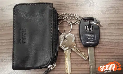 Honda driver looking for black Picard pouch he lost near Block 407 at Hougang Ave 10