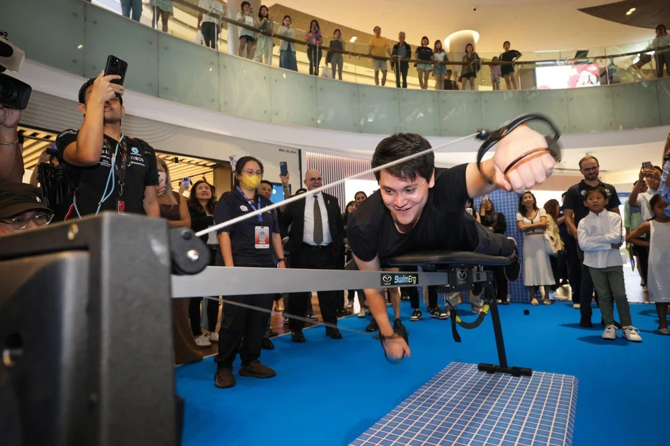 Singapore’s Rio Olympic swimming champion Joseph Schooling taking part in the Vasa Trainer Experience activity at World Aquatics Championships Community Roadshow in ION Orchard on May 9.