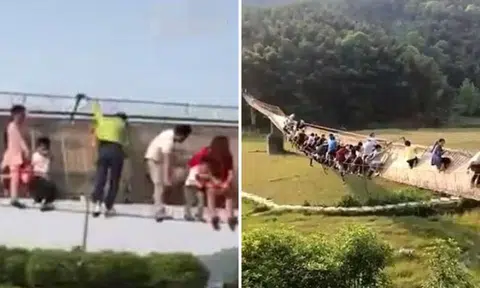 Tourists in China left hanging after huge crowd causes bridge to sway too far