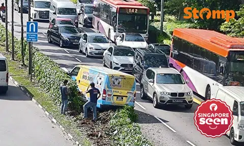 Van ends up on road divider in Toa Payoh, driver assisting with police investigations