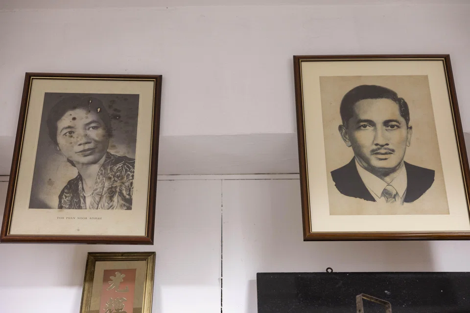 Portraits of Singapore's first president Yusof Ishak, and first first lady Puan Noor Aishah, found at Treasure At Home Vintage Store.