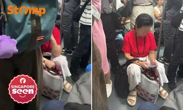 woman on stool in MRT train