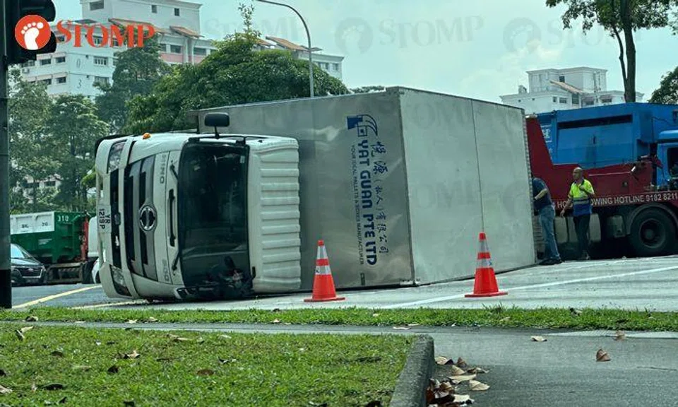 Burst tyre causes truck to topple on its side in Choa Chu Kang
