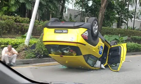 Cabby, 73, taken to hospital and assisting with investigations after taxi overturns at Sheares Ave