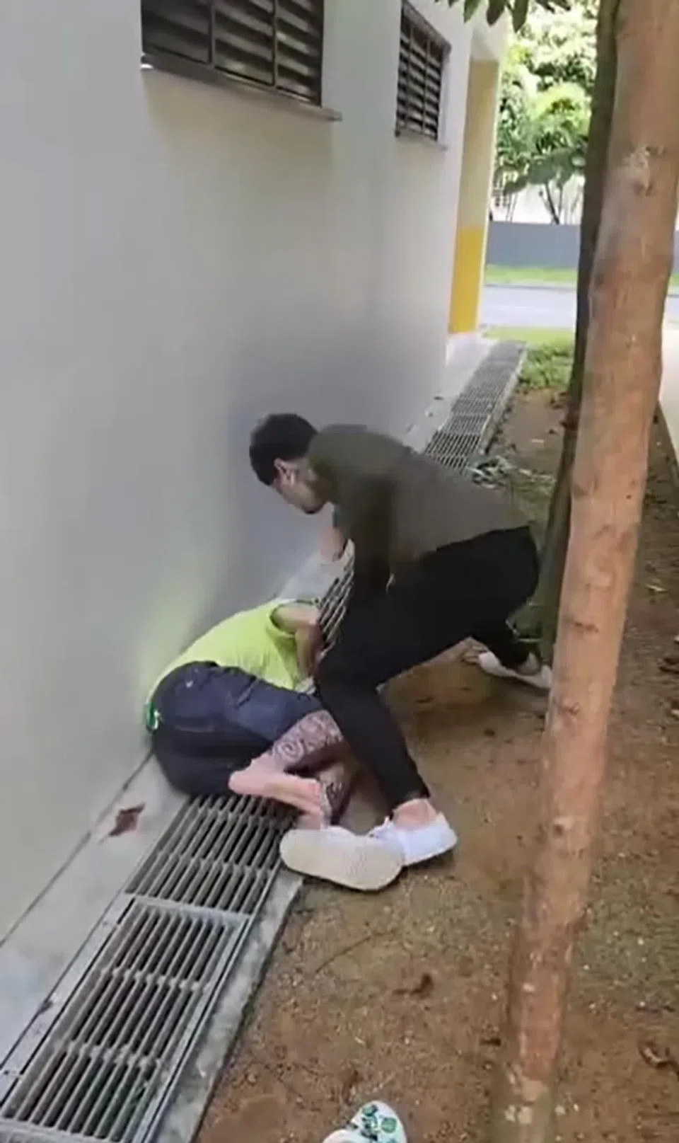 Police were alerted to a social media video showing two men engaging in a transaction before one man rains punches on the other.