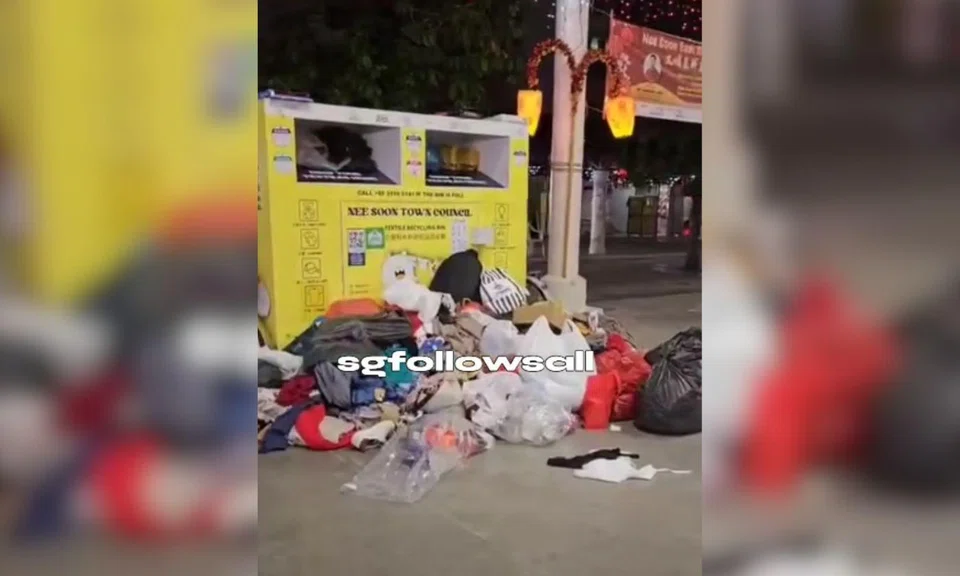 Donated clothes were seen spilling out of a Cloop bin at Nee Soon East Seniors' Hub on Jan 28.