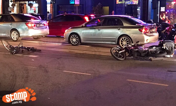 Cyclist sent to hospital after colliding with motorcyclist at Geylang ...