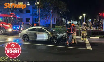 Car on fire at Dawson Road junction