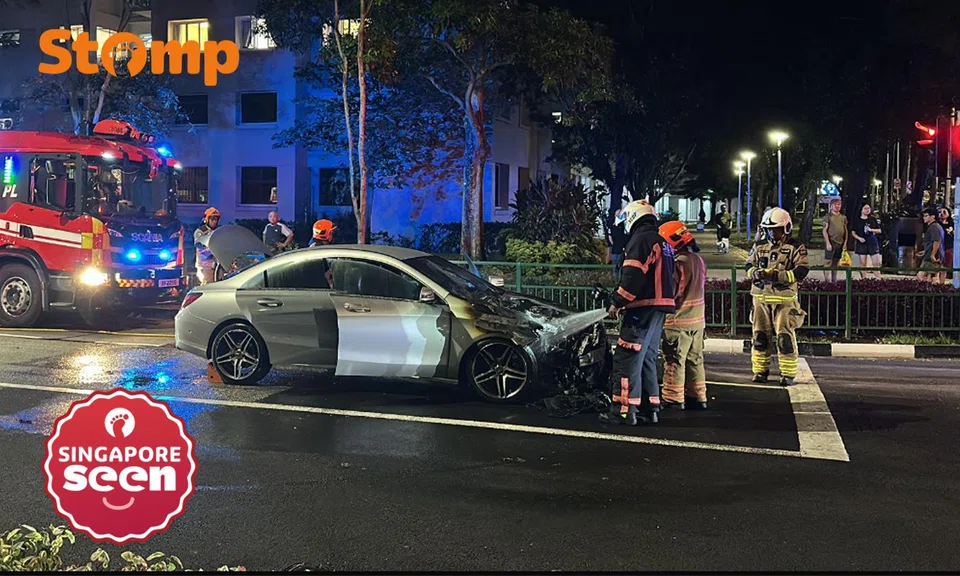 Car on fire at Dawson Road junction