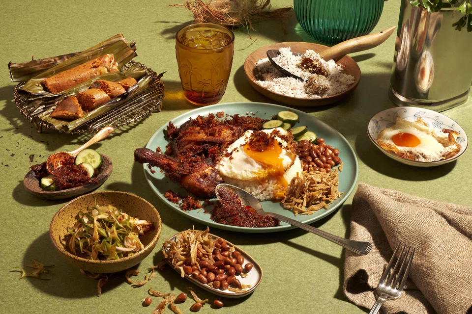 The Coconut Club's ayam goreng berempah nasi lemak spread.