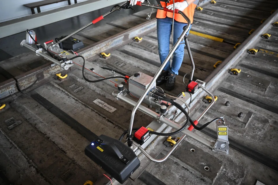 SMRT’s laser track trolleys are equipped with sensors that continuously capture data on the condition of rails over time, the curvature and evenness of tracks, and the alignment of the third rail.
