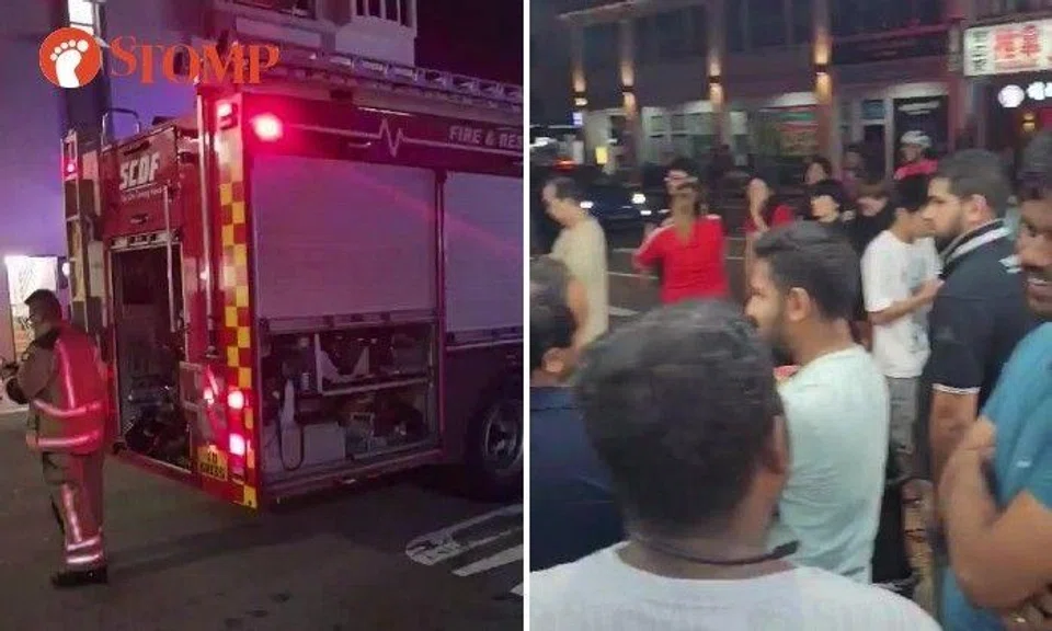 Stomper Len shared videos of Singapore Civil Defence Force (SCDF) and police vehicles at the scene as well as people gathered around a nearby shop selling durians.