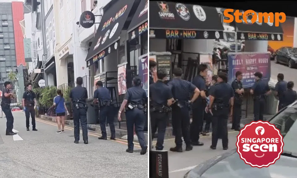 Woman, 57, apprehended by multiple police officers at Club Street 'pinned down hard': Witness