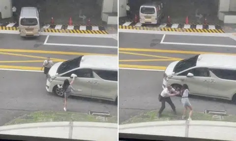 Woman kicks vehicle in Beach Road, driver slaps her and throws her to the ground