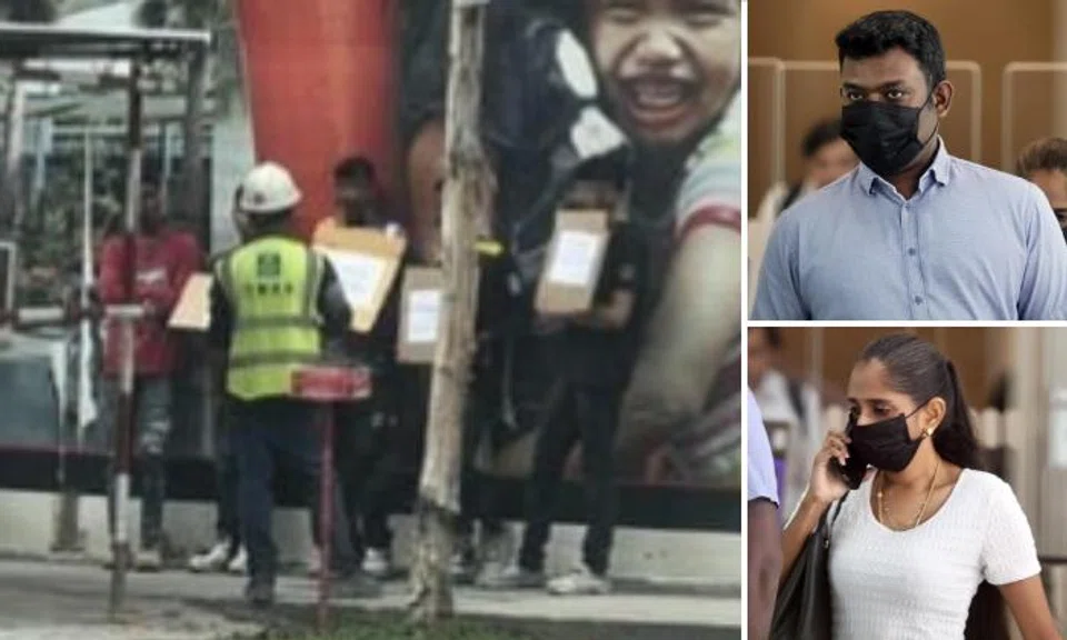 Woman fined for getting foreign workers to hold placards at worksites, husband fined for helping her