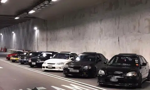 'Dude, check out my car': Fleet of Honda Civics block tunnel lanes for illegal photo shoot