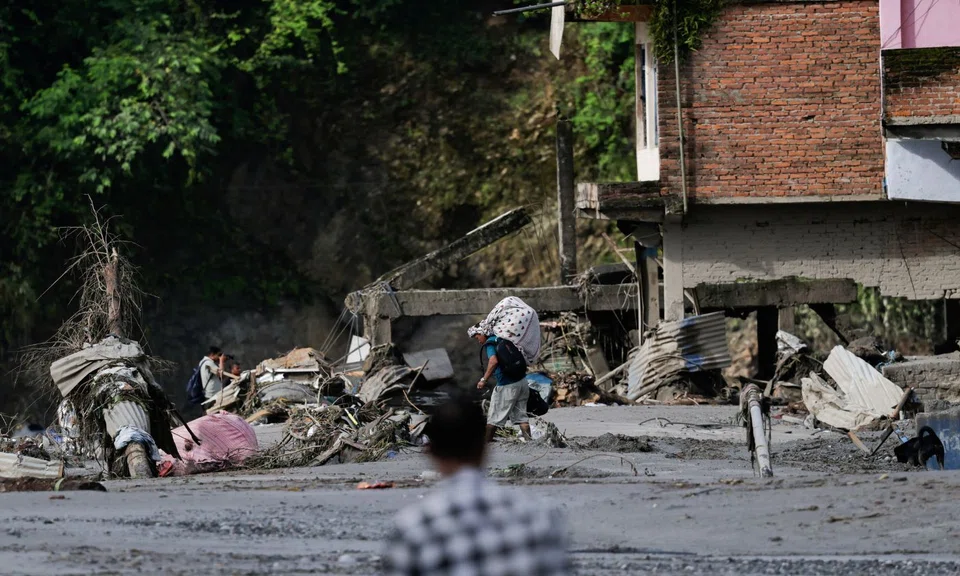 Husband of S’pore woman missing in Nepal floods doesn’t know what to tell daughter