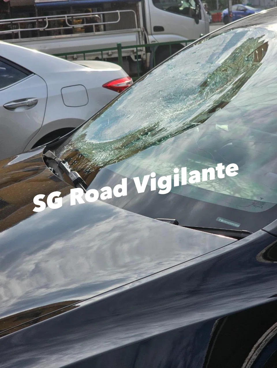 A car with a partially shattered windscreen was seen at the accident site.