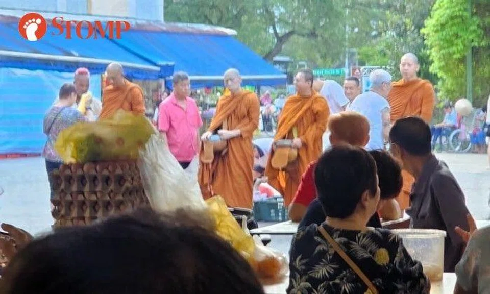 Men in monk's robes spotted collecting alms in Bedok, but money strictly not accepted