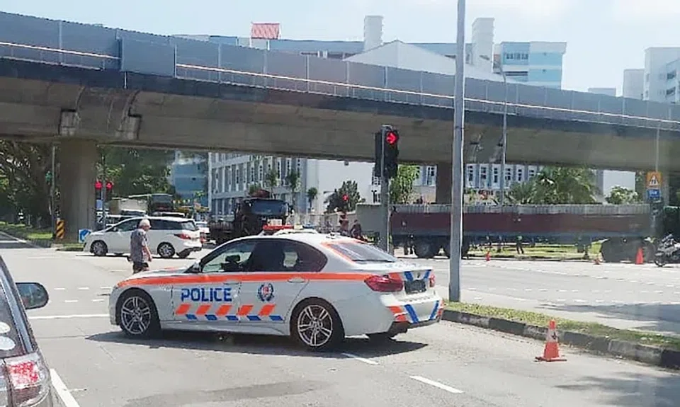 The prime mover driver was arrested for "driving without reasonable considerations to other road users, causing death", said police.