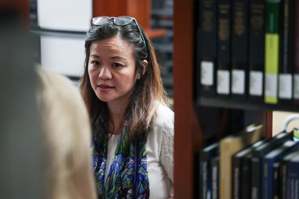 NUS university librarian Natalie Pang said that 9,000 out of the total number of 45,000 books in the college's library were duplicates or had a