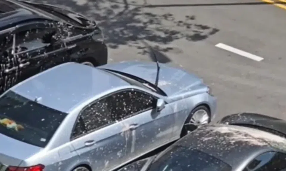 Part of a sedan’s windscreen also appears to have been smashed.
