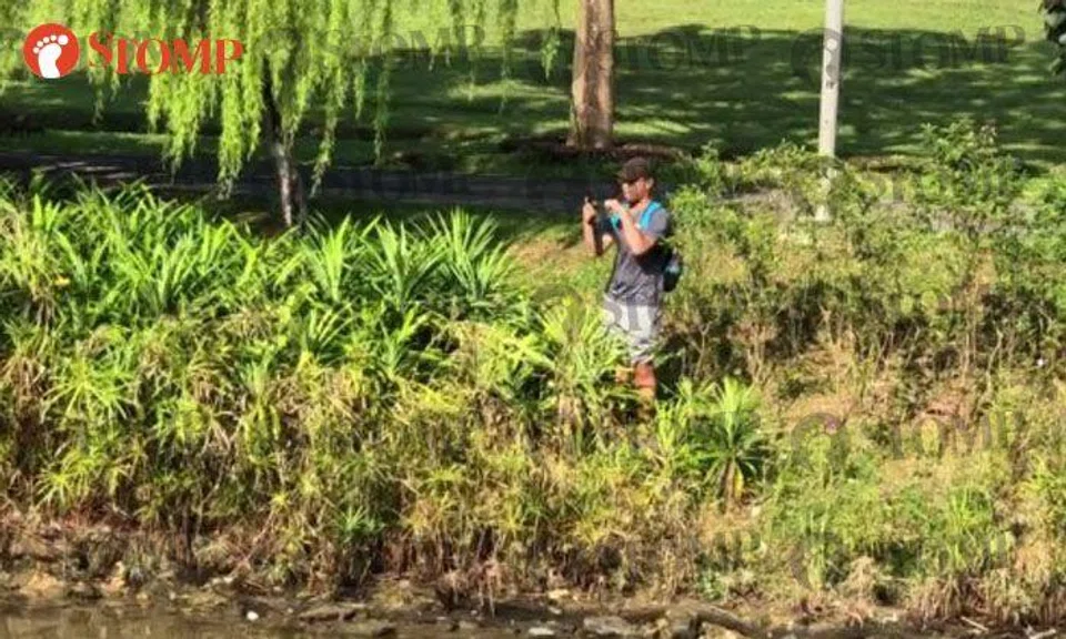 Man fishes at Punggol Waterway despite warning signs around