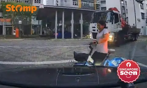 Woman almost hit by car while riding across road: 'Cycling irresponsibly can get you killed'