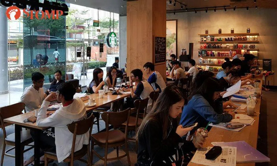 There's study area and library near Keat Hong CC -- but students choose to hog seats at Starbucks