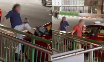 man kicks down side view mirror of taxi at chinatown