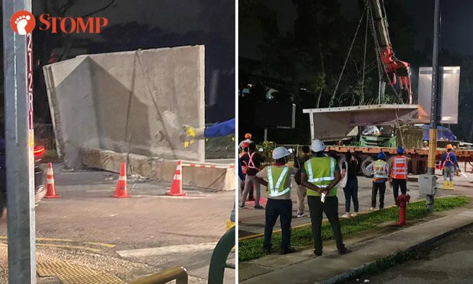 Trailer driver assisting with investigations after concrete slabs fall onto Upper Bukit Timah Road
