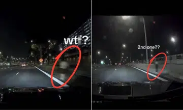 seventh month pedestrians walking along PIE shock driver