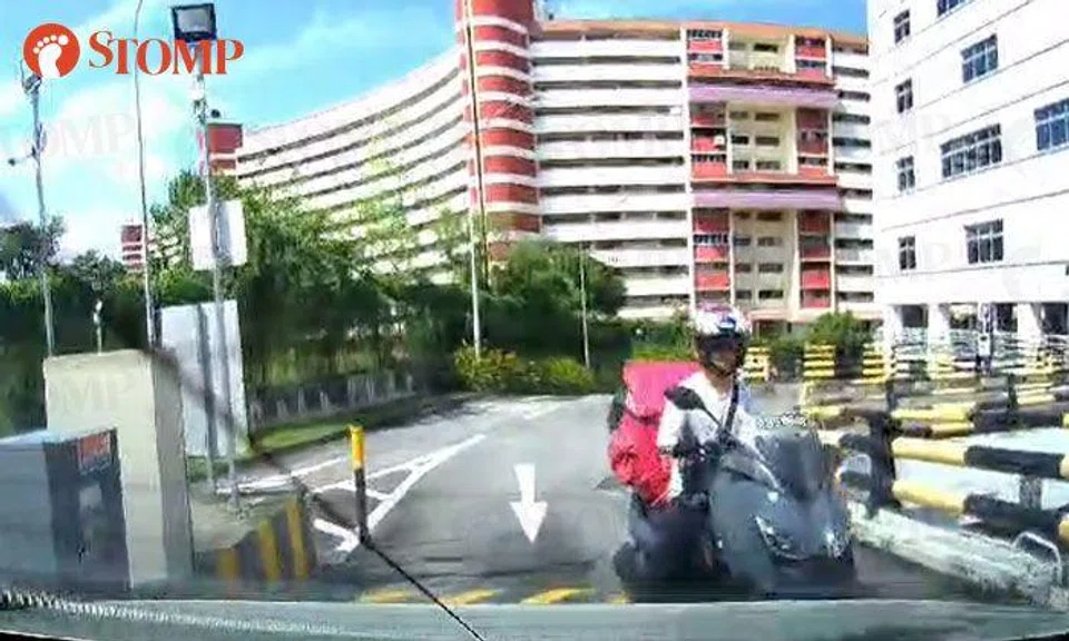 Driver ends up paying rider's $1.61 parking fee after motorcycle tailgates him out of Chai Chee carpark