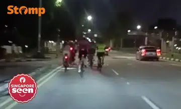 Cyclists hog lane on Nicoll Highway
