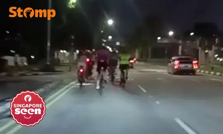 Cyclists hog lane on Nicoll Highway